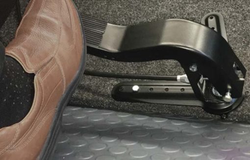 passenger foot operated dual brake pedal system